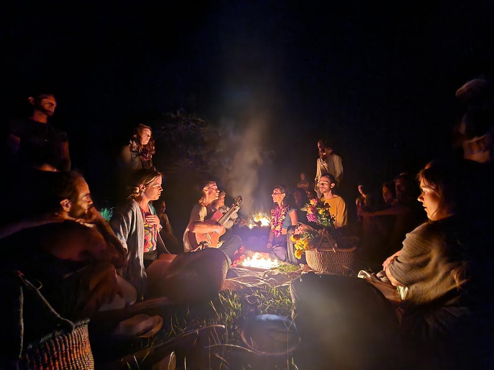 Group singing at the fire